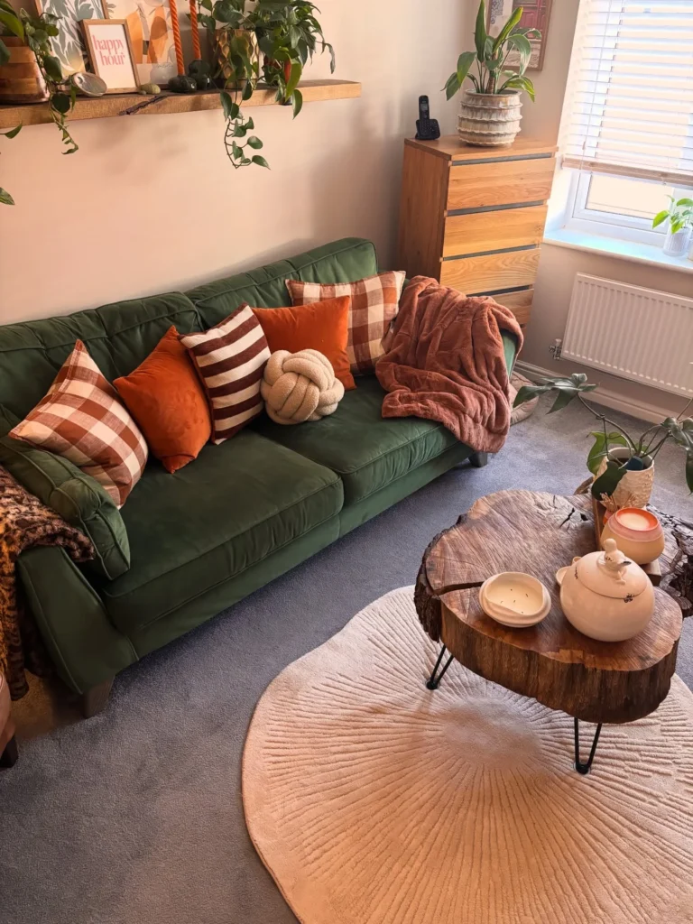 Forest Green Velvet Sofa With Rust and Plaid Cushions