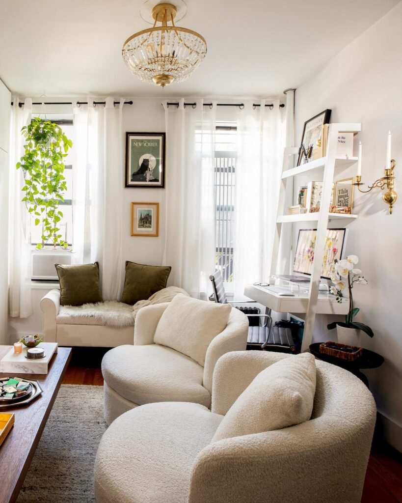 Glam Small Living Room With Crystal Chandelier and Boucle Chairs