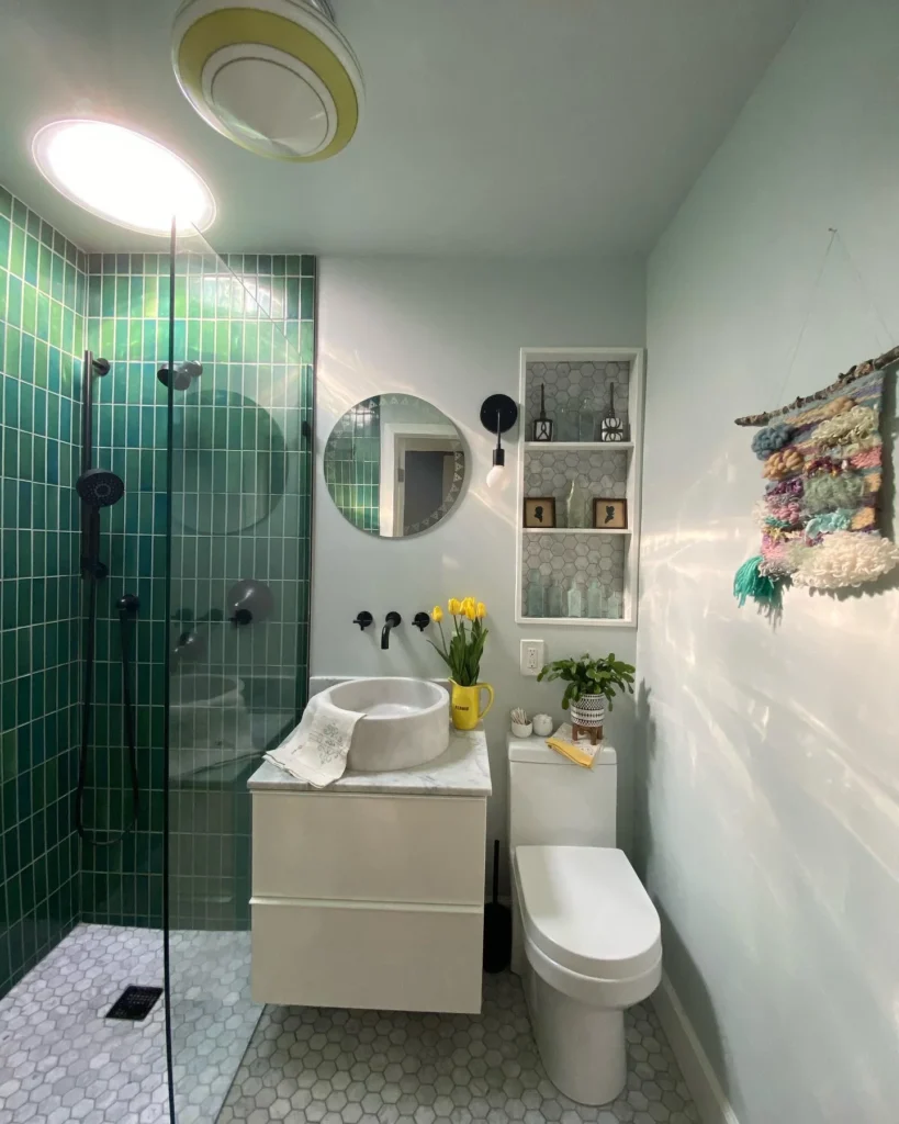 Go Bold With Glossy Green Tile and Eclectic Styling in a Small Bathroom