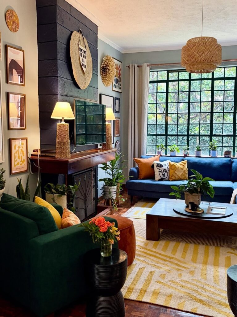 Jewel-Toned Living Room With Dark Fireplace Wall and Eclectic Decor