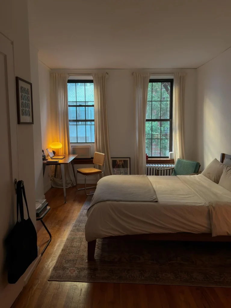 Minimal New York Studio With Desk Tucked Between Two Windows
