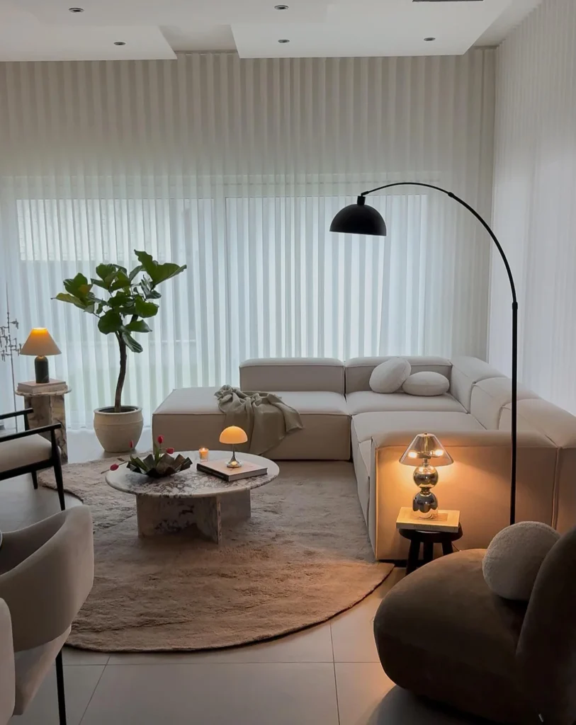 Modern Minimal Living Room With Marble Coffee Table and Warm Lamp Glow