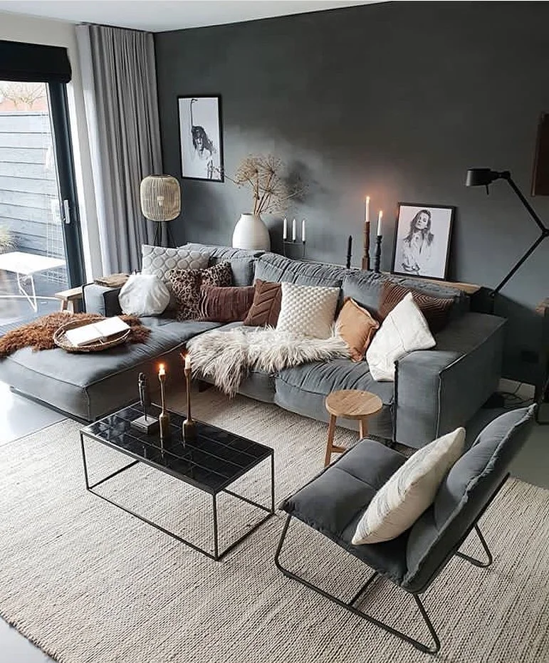 Moody Dark Grey Living Room With Candlelight and Faux Fur Throws