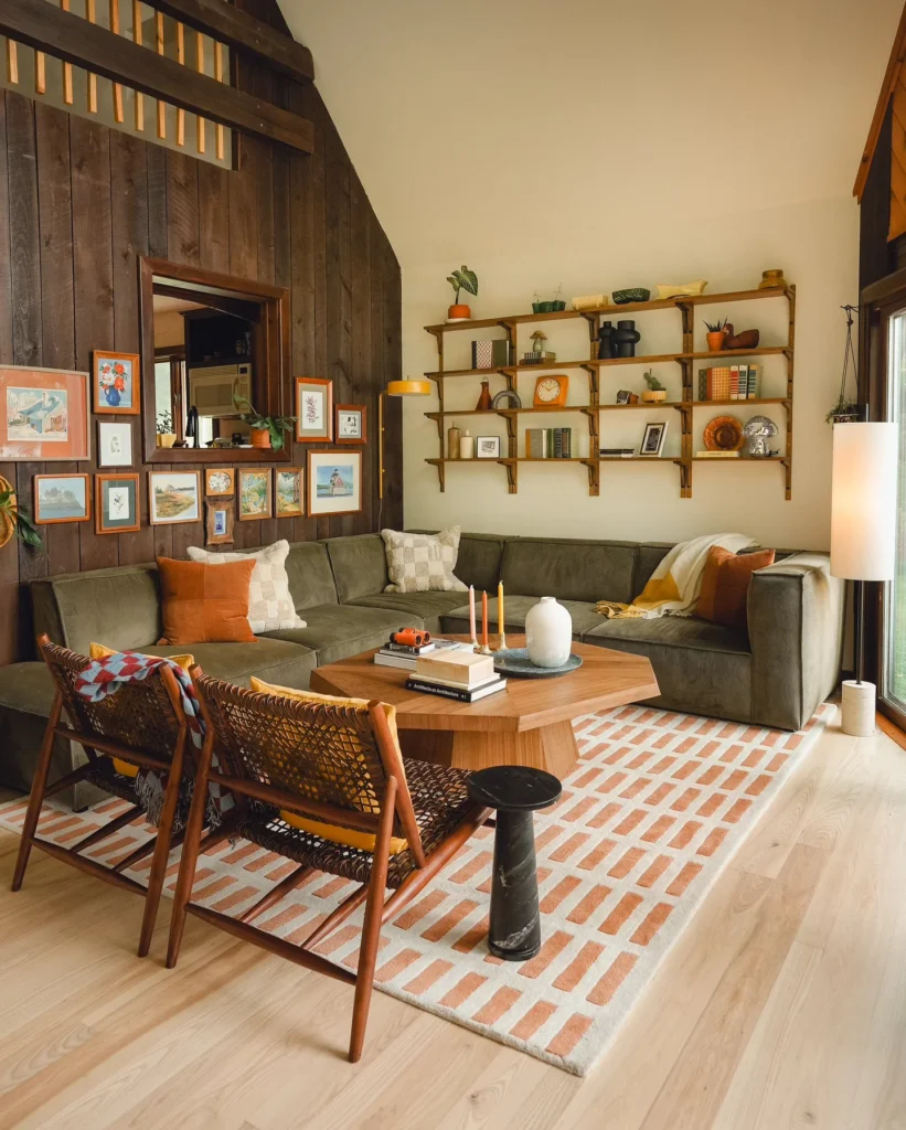 Retro A-Frame Living Room With Dark Wood Paneling and Terracotta Rug